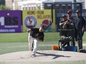 Keegan Kwong pitches during the Edmonton Prospects' open tryouts at Re/Max Field in Edmonton on Saturday, May 27, 2017.