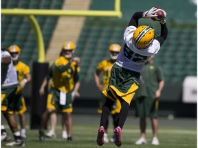 Lararius Vanlier catches a pass during the first day of training camp for the Eskimos on Sunday May 28, 2017, in Edmonton.