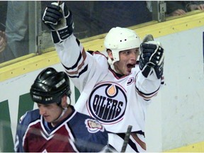 Edmonton Oilers captain Kelly Buchberger celebrates one of his two goals on May 5, 1998, against the Colorado Avalanche at Edmonton Coliseum.