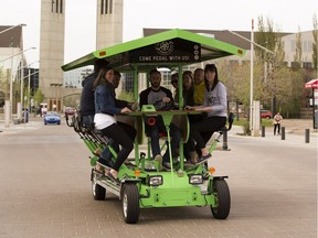 Matt Gosse takes people on his 15-passenger bike for Urban Tours, a new Edmonton company that takes people on a two-hour pedal tour of three local pubs on Friday May 12, 2017, in Edmonton.