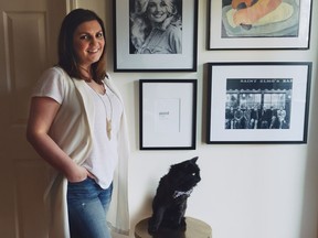 Edmonton-based interior designer Candace Wolfe — with her cat Leopold — says pets don't have to diminish your home's decor, as long as you select appropriate materials and implement some basic design strategies.