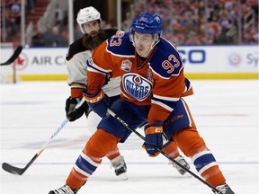 Edmonton Oilers centre Ryan Nugent-Hopkins battles Anaheim Ducks forward Patrick Eaves during first period NHL action at Rogers Place in Edmonton April 30, 2017.