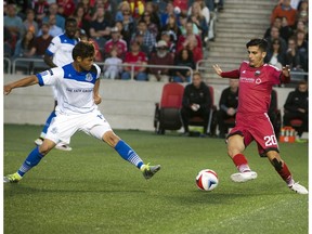 Ottawa Fury FC Mauro Eustaquio battles for the ball against Dustin Corea of the FC Edmonton at TD Place Stadium Friday September 2, 2016.