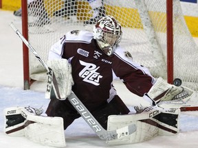 The Edmonton Oilers have signed Peterborough Petes goalie Dylan Wells to a three-year entry-level contract.