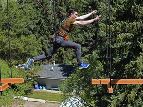 Reporter Scott Leitch trying his skills on the new Snow Valley Aerial Park attraction in Edmonton, May 19, 2017.