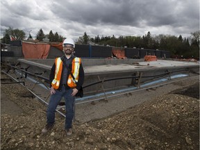 City project manager Robb Heit stands in front of the Borden Park pool construction site. The high tech 'natural' pool, which is supposed to open this August, will be the first of its kind in Canada.