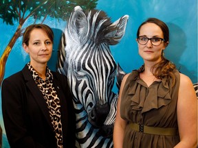 Sgt. Christa Laforce with the Edmonton Police Service Child Protection Section, left, poses with Samantha Dover, Director of Community Education and Engagement, right, at the Zebra Child Protection Centre in Edmonton on Monday, May 29, 2017.