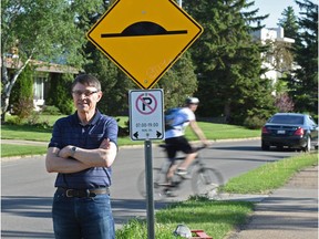 Steve Schroeter, chair of the transportation committee of the Belgravia Community League, at one of the traffic measures introduced last year to increase safety.