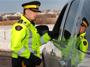 Sheriffs and RCMP conduct a checkstop on Highway 21 and Township road 524 near Edmonton in November 2013. A new Court of Appeal decision says it's unconstitutional to suspend the licence of a suspected impaired driver before that driver is found guilty.