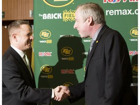 The Edmonton Eskimos President and CEO Len Rhodes introduces new general manager Brock Sunderland at Commonwealth Stadium in the Eskimos locker room on Tuesday April 25, 2017, in Edmonton.