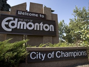 The Edmonton Welcome sign alongside Baseline Road and 101 Avenue on the east side of the city, which includes the city slogan "City of Champions"  in Edmonton, Alta., on Friday, Sept. 13, 2013. File photo.