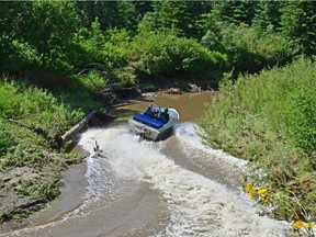 Former RCMP officer Wayne Oakes photographed two jet boats he said were operating dangerously on Whitemud Creek July 31, 2016. Volunteer photographers say they'll be working to catch anyone else trying this during high water.