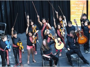 The Prince Charles Fiddlers at the end of their performance during National Aboriginal Day kickoff at City Centre Mall in Edmonton, June 19, 2017. National Aboriginal Day, officially on June 21, recognizes and celebrates the unique heritage, diverse cultures and outstanding contributions of First Nations, Inuit and Metis peoples.