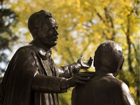 Edmonton artist Barbara Paterson's sculpture of Henry Marshall Tory and Alberta's first premier, Alexander Rutherford after the unveiling of the new monument on September 24, 2015 in Edmonton, to two of the University of Alberta's founders. File photo.
