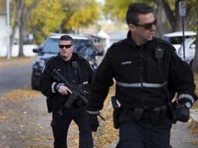 Police surround a home on Thursday, September 29, 2016  in Edmonton. Greg  Southam / Postmedia
