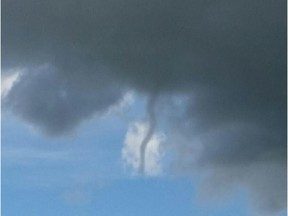A file photo shows a funnel cloud near Cross Iron Mills north of Calgary in 2015.