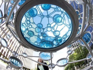 Transect, a new permanent public sculpture, created by Alberta glass artists Julia Reimer and Tyler Rock, has been installed along 108 Street north of 99 Avenue in Edmonton. The two-metre sphere is made of hand-crafted blue glass tiles that feature historic images of Edmonton and Alberta.
