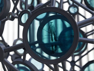 Transect, a new permanent public sculpture, created by Alberta glass artists Julia Reimer and Tyler Rock, has been installed along 108 Street north of 99 Avenue in Edmonton. The two-metre sphere is made of hand-crafted blue glass tiles that feature historic images of Edmonton and Alberta.