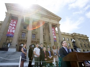 Les Hagen, Executive Director of Action on Smoking and Health, and members of The Campaign for a Smoke-Free Alberta speak to members of the media as they urge the Alberta Government to take further measures to protect youth from tobacco, on the steps of the Alberta Legislature in Edmonton Monday June 26, 2017.