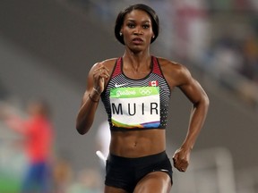 Carline Muir of Canada competes in the Women's 400-metre semifinal on Day 9 of the Rio 2016 Olympic Games at the Olympic Stadium on Aug. 14, 2016.