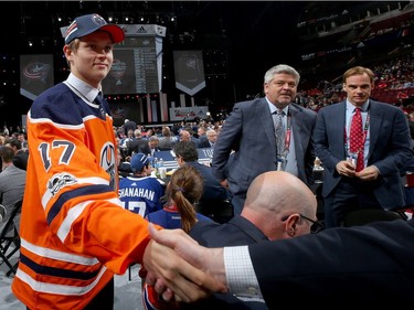 Ostap Safin meets with executives after being selected 115th overall by the Edmonton Oilers during the 2017 NHL Draft on June 24, 2017 in Chicago.