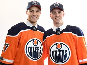 Goalie Stuart Skinner, left, and winger Dmitri Samorukov pose for a portrait after being selected by the Edmonton Oilers at the 2017 NHL Draft on June 24, 2017, in Chicago.