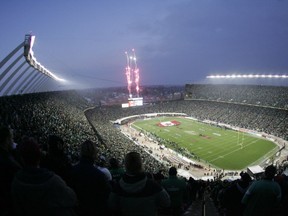 Fireworks fly at the start of the 98th Grey Cup held at Commonwealth Stadium in Edmonton on Nov. 28, 2010.