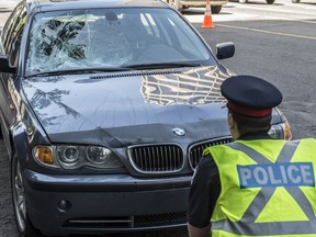 A pedestrian was struck by a westbound car on Jasper Avenue at 105 Street just before the lunch hour in  Edmonton on June 7, 2017.  The man may have been involved in a scuffle on the sidewalk before running into traffic.