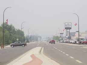 A view from the end of Franklin Avenue as smoke from a forest fire fills the sky in Fort McMurray on Friday June 2, 2017. The fire began in Wood Buffalo National Park, 40 km southwest of Fort Chipewyan, though Parks Canada confirmed there was no danger posed by the fire.