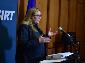 Susan Hughson, executive director of ASIRT, said police officers have been cleared of any wrongdoing after an investigation found a man who died in the back of a van while being taken to the Edmonton Remand Centre suffered a heart attack.