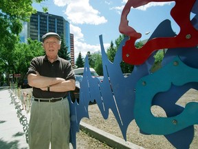 Roy Leadbeater beside Aurora's Dance, commissioned to be displayed on 104 St.