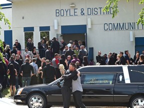 Mourners leave the celebration of life for Tim Hague, the boxer that died after a fight, was held at the Boyle Community Centre, June 26, 2017.