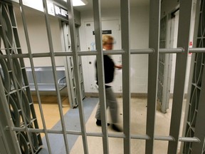 A corrections official walks through the maximum security Edmonton Institution on Jan. 10, 2011.