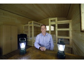 Leduc County parks and recreation director Dean Ohnysty sits inside one of the two new comfort camping cabins at Jubilee Park Campground beside Wizard Lake in Leduc County.