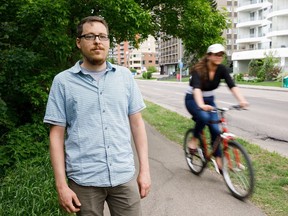 Conrad Nobert, vice chair of Paths for People, is photographed on a multi-use path along Saskatchewan Drive near 109 Street in Edmonton on Sunday, June 4, 2017. His group is calling for the city to make these shared paths wider and separate wheeled and non-wheeled users.