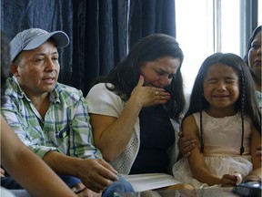 Jilmar David Picon and Yolanda Duarte Martinez at a news conference June 20 about a deportation order that would split up the family. The family was ordered to be deported to Guatemala, where they fear for their lives. Their five children, Edisson Esmith Picon, 23, Nely Arely Picon, 18, Leonardo David Picon, 17, Michael Otoniel Picon, 12, and Beverly Nicole Picon, 6, were set to be deported to the United States. The family will be torn apart for the first time in their lives. In this photo Leonardo Picon, left, and Beverly Picon, right, break down in tears. They learned in late June that the government was staying the order to give them time to reapply for permanent residency.