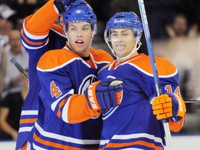 EDMONTON, ALTA: October 7, 2010 -- Oiler Jordan Eberle celebrates his second goal with line mate #4 Taylor Hall as the Edmonton Oilers defeated  the Calgary Flames 4 - 0 in the first game of the regular season at Rexall Place in Edmonton, October 7, 2010. (Ed Kaiser-Edmonton Journal)
Ed Kaiser, Ed Kaiser