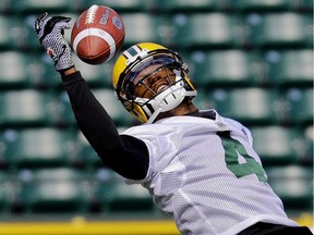 Edmonton Eskimos slotback Adarius Bowman reaches for the ball during team practice at Commonwealth Stadium in Edmonton on June 8, 2017.