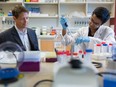 University of Alberta prostate cancer researcher Dr. John Lewis, left, works with graduate student Srijan Raha in this file photo.