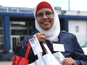 Afshan Fatima, outreach co-ordinator with the Islamic Circle of North America (ICNA) Sisters of Edmonton, drops off gift bags as part of the ICNA Sisters' Uplift 150 for Canada 150 project at Boyle Street Community Services at 10116 105 Ave. in Edmonton, Alta., on Thursday, June 29, 2017. The ICNA Sisters filled 150 reusable gift bags with treats and personal care items as a way to share the Canadian spirit in honour of Canada's 150th anniversary of Confederation.
