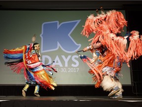 Waniya Cardinal (left) and Darrell Brertton dance during the K-Days media launch at Edmonton Expo Centre in Edmonton, Alberta on Tuesday, June 13, 2017. The fair includes a competitive Pow Wow with participants from across the continent including those from Treaty Six territory.