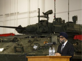 Defence Minister Harjit S. Sajjan speaks about Canada's priorities in the space and cybersecurity as part of Canada's new defence policy at 3 Division Support Base Edmonton at CFB Edmonton on Wednesday, June 14, 2017.