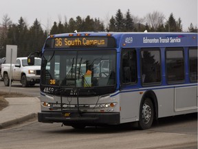 An Edmonton Transit System bus runs through congrested rush hour traffic at the intersection of Terwillegar Drive and 40 Avenue in Edmonton on Friday, March 24, 2017.