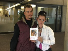 John and Desiree Knoll pose with a picture of their daughter Nevaeh Michaud who died in an Edmonton group home in 2014 on Monday, June 12, 2017. The parents were at Edmonton's Provincial Courts attending the fatality inquiry into their daughter's death from an overdose of a sleep aid while in care.