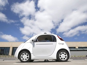 In this May 13, 2015, file photo, Google's new self-driving prototype car is presented during a demonstration at the Google campus in Mountain View, Calif.