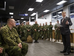 Latvian ambassador Karlis Eihenbaums thanks the approximately 100 soldiers from 1 Canadian Mechanized Brigade Group deploying to Latvia at Edmonton International Airport in Nisku on Friday, June 9, 2017.