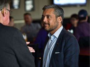 Alberta Liberal Leader David Khan, pictured talking to a supporter in Edmonton on April 22, 2017.