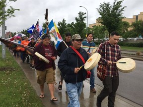 Members from Edmonton's school districts gathered for a smudge walk Friday, June 2, 2017, to mark the second anniversary of the Truth and Reconciliation Commission report.