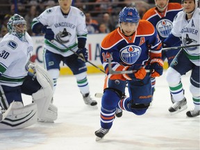 EDMONTON, AB. OCTOBER 17, 2014 -Jordan Eberle (14)of the Edmonton Oilers, against the Vancouver Canucks at Rexall Place in Edmonton. Shaughn Butts/Edmonton Journal
Shaughn Butts, Edmonton Journal