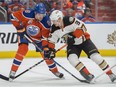 Griffin Reinhart of the Edmonton Oilers, makes his playoff debut against Jakob Silfverberg of the Anaheim Duck in Game 6 in the second round of NHL playoffs at Rogers Place on May 7, 2017.